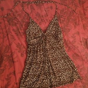 Stretchy Leopard print drawstring halter top.